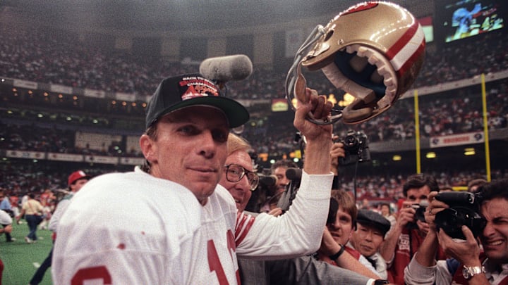 Jan 28, 1990; New Orleans, LA, USA; FILE PHOTO; San Francisco 49ers quarterback Joe Montana (16) on the field after defeating the Denver Broncos during Super Bowl XXIV at the Superdome. The 49ers defeated the Broncos 55-10. 