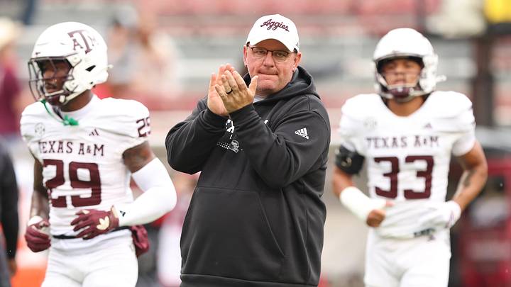 Texas A&M Aggies head coach Mike Elko prior to the game against the Arkansas Razorbacks at Donald W. Reynolds Razorback Stadium. Texas A&M Aggies head coach Mike Elko prior to the game against the Arkansas Razorbacks at Donald W. Reynolds Razorback Stadium.