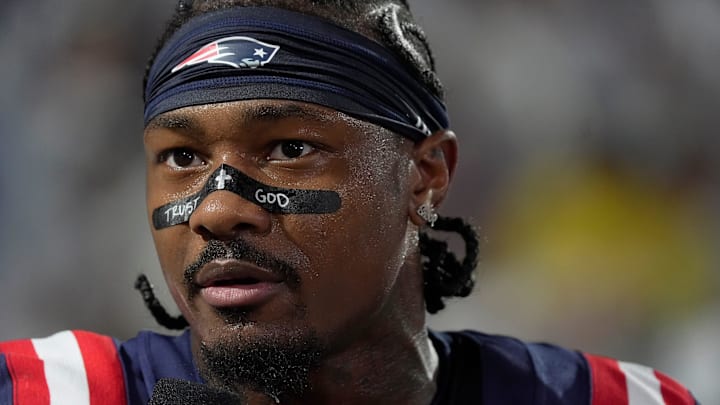 New England Patriots wide receiver Stefon Diggs talks with a sidelines reporter before the Bills home game against the New England Patriots at Highmark Stadium in Orchard Park on Oct. 5, 2025.