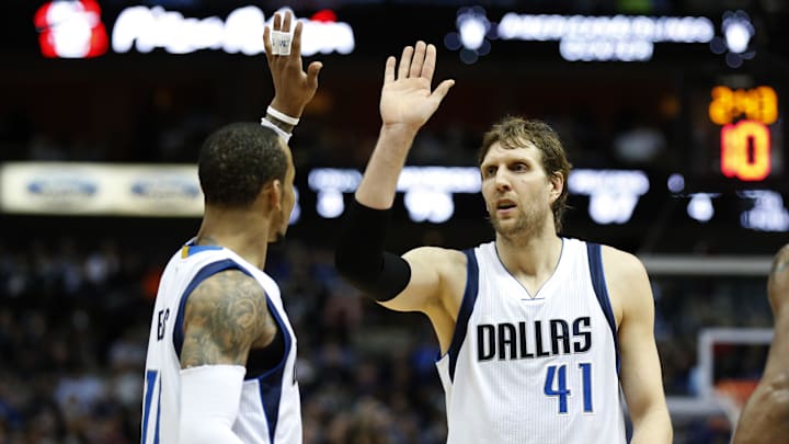 Mar 2, 2015; Dallas, TX, USA; Dallas Mavericks forward Dirk Nowitzki (41) celebrates with guard Monta Ellis (11) in the fourth quarter against the New Orleans Pelicans at American Airlines Center. The Mavs beat the Pelican 102-93. Mandatory Credit: Matthew Emmons-Imagn Images