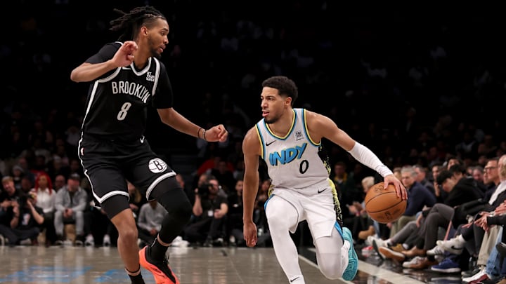 Jan 6, 2025; Brooklyn, New York, USA; Indiana Pacers guard Tyrese Haliburton (0) controls the ball against Brooklyn Nets forward Ziaire Williams (8) during the second quarter at Barclays Center. Mandatory Credit: Brad Penner-Imagn Images Jan 6, 2025; Brooklyn, New York, USA; Indiana Pacers guard Tyrese Haliburton (0) controls the ball against Brooklyn Nets forward Ziaire Williams (8) during the second quarter at Barclays Center. Mandatory Credit: Brad Penner-Imagn Images