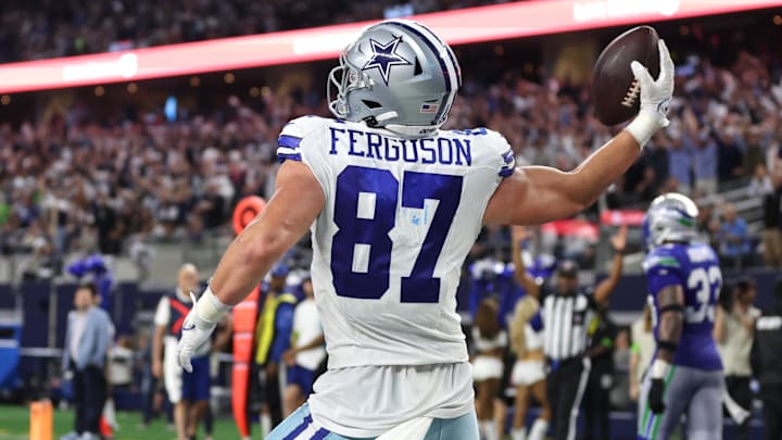 Nov 30, 2023; Arlington, Texas, USA; Dallas Cowboys tight end Jake Ferguson (87) celebrates after a