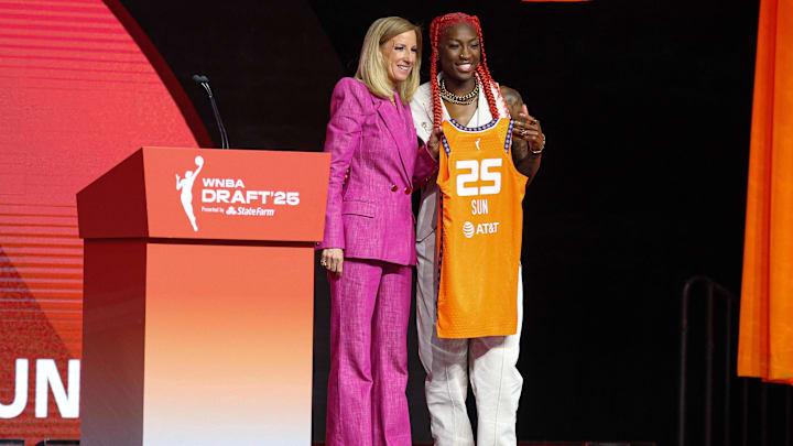 Apr 14, 2025; New York, New York, USA; Saniya Rivers poses with WNBA commissioner Cathy Engelbert after being selected with the number eight overall pick to the Connecticut Sun in the 2025 WNBA Draft at The Shed at Hudson Yards. Mandatory Credit: Vincent Carchietta-Imagn Images at The Shed. Apr 14, 2025; New York, New York, USA; Saniya Rivers poses with WNBA commissioner Cathy Engelbert after being selected with the number eight overall pick to the Connecticut Sun in the 2025 WNBA Draft at The Shed at Hudson Yards. Mandatory Credit: Vincent Carchietta-Imagn Images at The Shed.