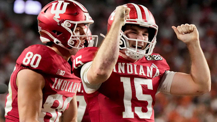 Indiana Hoosiers quarterback Fernando Mendoza (15) celebrates with his teammates after rushing for a touchdown Monday, Jan. 19, 2026, during the College Football Playoff National Championship college football game at Hard Rock Stadium in Miami Gardens. Indiana Hoosiers quarterback Fernando Mendoza (15) celebrates with his teammates after rushing for a touchdown Monday, Jan. 19, 2026, during the College Football Playoff National Championship college football game at Hard Rock Stadium in Miami Gardens.