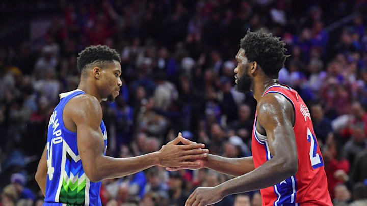 Nov 18, 2022; Philadelphia, Pennsylvania, USA; Milwaukee Bucks forward Giannis Antetokounmpo (34) and Philadelphia 76ers center Joel Embiid (21) congradulate each other after game at Wells Fargo Center. Mandatory Credit: Eric Hartline-Imagn Images