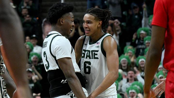 Mar 5, 2026; East Lansing, Michigan, USA; Michigan State Spartans forward Cameron Ward (3) cheers forward Jordan Scott (6) against Rutgers Scarlet Knights during the second half at Jack Breslin Student Events Center. Mandatory Credit: Dale Young-Imagn Images Mar 5, 2026; East Lansing, Michigan, USA; Michigan State Spartans forward Cameron Ward (3) cheers forward Jordan Scott (6) against Rutgers Scarlet Knights during the second half at Jack Breslin Student Events Center. Mandatory Credit: Dale Young-Imagn Images