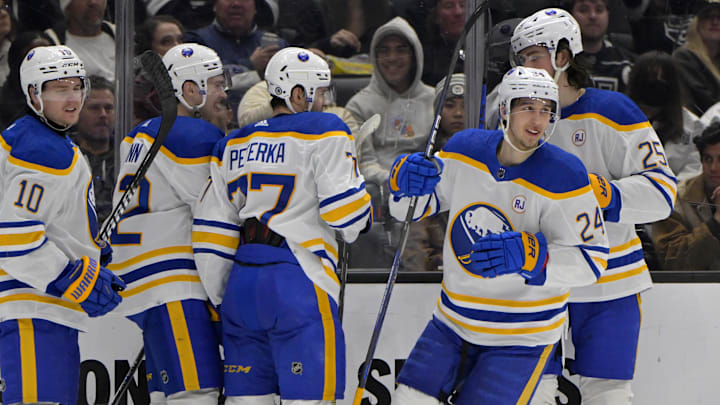 Jan 24, 2024; Los Angeles, California, USA; Buffalo Sabres center Dylan Cozens (24), right, is