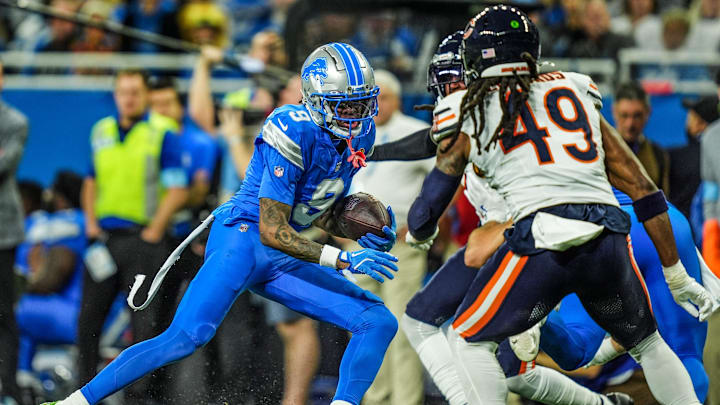 Lions wide receiver Jameson Williams runs out of room near the sideline against Tremaine Edmunds and the Bears defense.