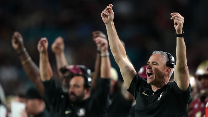 Dec 30, 2023; Miami Gardens, FL, USA; Florida State Seminoles head coach Mike Norvell reacts against the Georgia Bulldogs during the second half in the 2023 Orange Bowl at Hard Rock Stadium. Mandatory Credit: Jasen Vinlove-USA TODAY Sports Dec 30, 2023; Miami Gardens, FL, USA; Florida State Seminoles head coach Mike Norvell reacts against the Georgia Bulldogs during the second half in the 2023 Orange Bowl at Hard Rock Stadium. Mandatory Credit: Jasen Vinlove-USA TODAY Sports