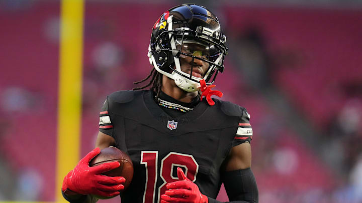 Arizona Cardinals receiver Marvin Harrison Jr. (18) warms up before their game against the Los Angeles Chargers at State Farm Stadium in Glendale on Oct. 21, 2024.