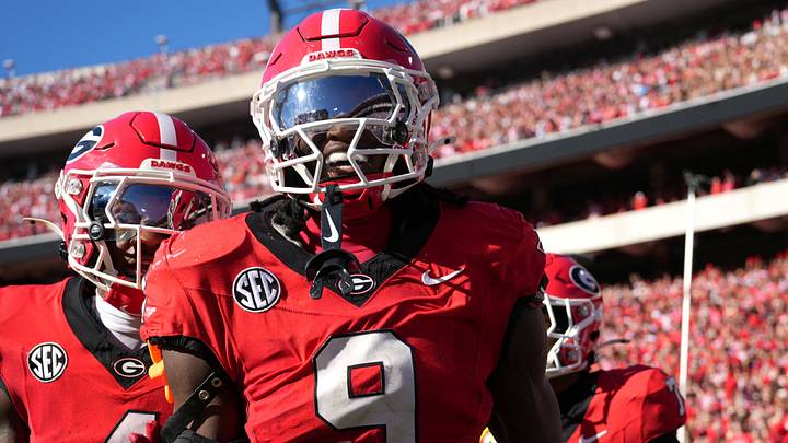Sep 26, 2026; Athens, Georgia, USA; Georgia Bulldogs linebacker Chris Cole (9) celebrates with defensive back KJ Bolden (4) after running for an eighty-five touchdown on a fumble recovery against Oklahoma Sooners quarterback John Mateer (not pictured) during the first half at Sanford Stadium. Mandatory Credit: Dale Zanine-Imagn Images Sep 26, 2026; Athens, Georgia, USA; Georgia Bulldogs linebacker Chris Cole (9) celebrates with defensive back KJ Bolden (4) after running for an eighty-five touchdown on a fumble recovery against Oklahoma Sooners quarterback John Mateer (not pictured) during the first half at Sanford Stadium. Mandatory Credit: Dale Zanine-Imagn Images