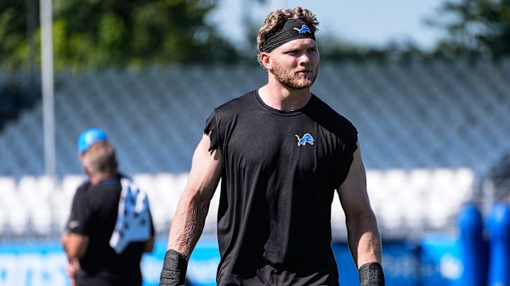 Detroit Lions defensive end Aidan Hutchinson walks off the field after practice during training camp at Meijer Performance Center in Allen Park on Tuesday, July 22, 2025.