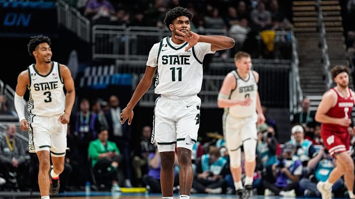 Michigan State guard Jase Richardson (11) celebrates a three point basket against Wisconsin during the first half of Big Ten Tournament semifinal at Gainbridge Fieldhouse in Indianapolis, Ind. on Saturday, March 15, 2025.