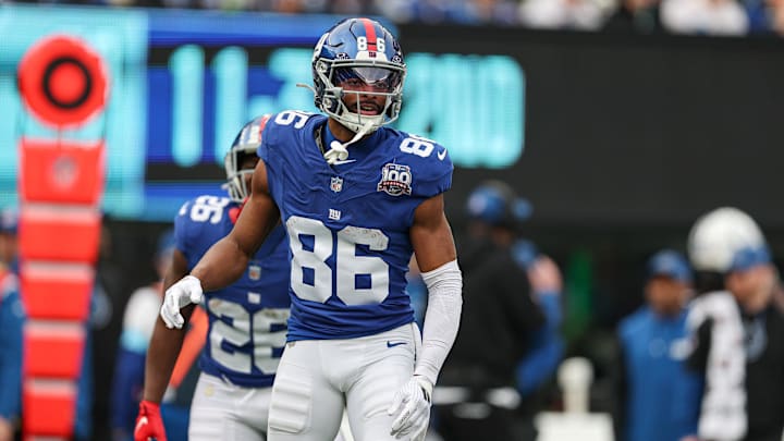 Dec 29, 2024; East Rutherford, New Jersey, USA; New York Giants wide receiver Darius Slayton (86) celebrates after scoring a touchdown reception during the first half against the Indianapolis Colts at MetLife Stadium. Mandatory Credit: Vincent Carchietta-Imagn Images