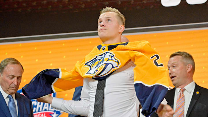 Jul 7, 2022; Montreal, Quebec, CANADA; Joakim Kemell after being selected as the number seventeen overall pick to the Nashville Predators in the first round of the 2022 NHL Draft at Bell Centre. Mandatory Credit: Eric Bolte-Imagn Images