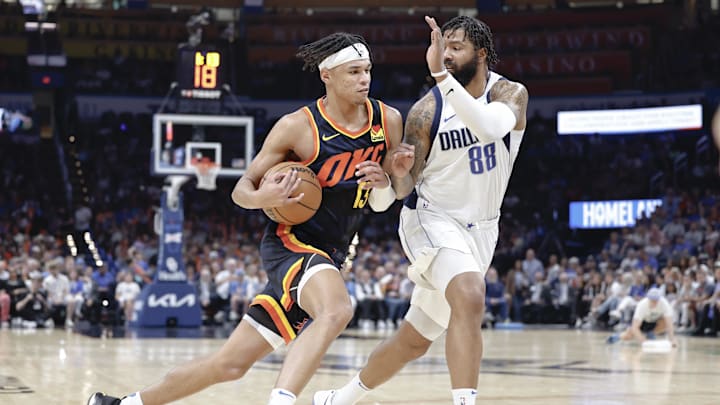 Apr 14, 2024; Oklahoma City, Oklahoma, USA; Oklahoma City Thunder forward Ousmane Dieng (13) drives to the basket beside Dallas Mavericks forward Markieff Morris (88) during the second half at Paycom Center. Mandatory Credit: Alonzo Adams-Imagn Images Apr 14, 2024; Oklahoma City, Oklahoma, USA; Oklahoma City Thunder forward Ousmane Dieng (13) drives to the basket beside Dallas Mavericks forward Markieff Morris (88) during the second half at Paycom Center. Mandatory Credit: Alonzo Adams-Imagn Images