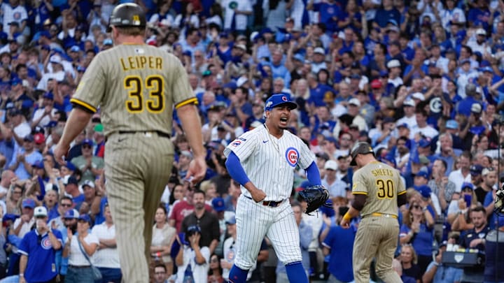Oct 2, 2025; Chicago, Illinois, USA; Chicago Cubs relief pitcher Daniel Palencia (48) reacts after striking out San Diego Padres right fielder Fernando Tatis Jr. (23) to end the fifth inning during game three of the Wildcard round for the 2025 MLB playoffs at Wrigley Field. Mandatory Credit: David Banks-Imagn Images