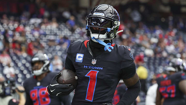 Oct 6, 2024; Houston, Texas, USA; Houston Texans wide receiver Stefon Diggs (1) warms up before the game against the Buffalo Bills at NRG Stadium. Mandatory Credit: Troy Taormina-Imagn Images