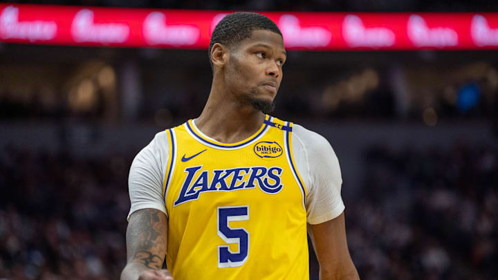 Dec 13, 2024; Minneapolis, Minnesota, USA; Los Angeles Lakers forward Cam Reddish (5) enters the court after a timeout in the second quarter against the Minnesota Timberwolves at Target Center. Mandatory Credit: Matt Blewett-Imagn Images