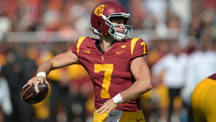 Oct 12, 2024; Los Angeles, California, USA; USC Trojans quarterback Miller Moss (7) throws a pass in the first half against the Penn State Nittany Lions United Airlines Field at Los Angeles Memorial Coliseum. Mandatory Credit: Jayne Kamin-Oncea-Imagn Images