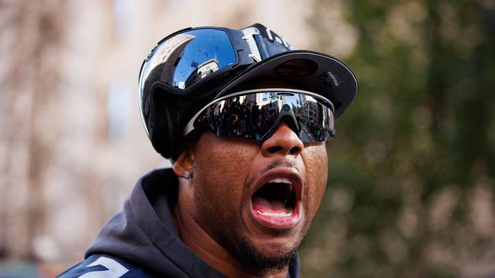 Seattle Seahawks linebacker Uchenna Nwosu reacts during the Super Bowl LX parade