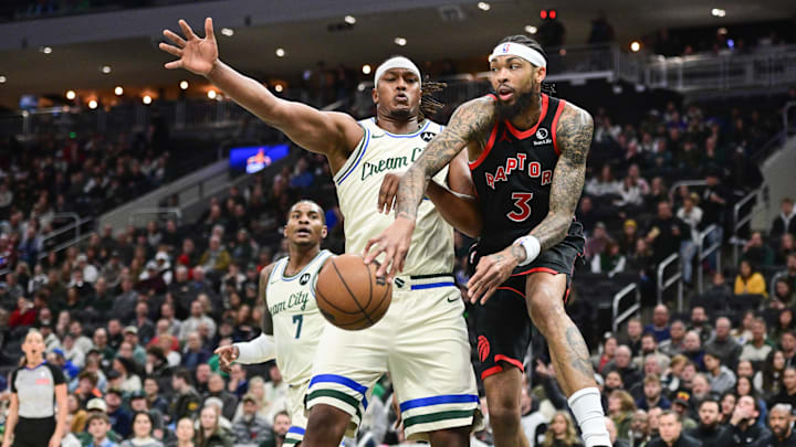 Dec 18, 2025; Milwaukee, Wisconsin, USA; Toronto Raptors forward Brandon Ingram (3) passes against Milwaukee Bucks center Myles Turner (3) in the first quarter at Fiserv Forum. Mandatory Credit: Benny Sieu-Imagn Images Dec 18, 2025; Milwaukee, Wisconsin, USA; Toronto Raptors forward Brandon Ingram (3) passes against Milwaukee Bucks center Myles Turner (3) in the first quarter at Fiserv Forum. Mandatory Credit: Benny Sieu-Imagn Images