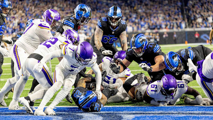 Jan 5, 2025; Detroit, Michigan, USA; Detroit Lions running back Jahmyr Gibbs (26) scores a touchdown against the Minnesota Vikings during the second half at Ford Field. Jan 5, 2025; Detroit, Michigan, USA; Detroit Lions running back Jahmyr Gibbs (26) scores a touchdown against the Minnesota Vikings during the second half at Ford Field.