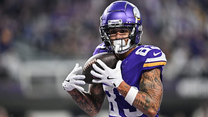 Dec 29, 2024; Minneapolis, Minnesota, USA; Minnesota Vikings wide receiver Jalen Nailor (83) catches a touchdown pass against the Green Bay Packers during the second quarter at U.S. Bank Stadium.