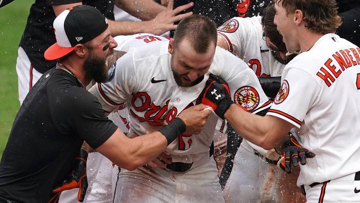 May 25, 2026; Baltimore, Maryland, USA; Baltimore Orioles outfielder Colton Cowser (17) celebrates with teammates after hitting the game-winning two run home run against the Tampa Bay Rays during the thirteenth inning at Oriole Park at Camden Yards. Mandatory Credit: Mitch Stringer-Imagn Images