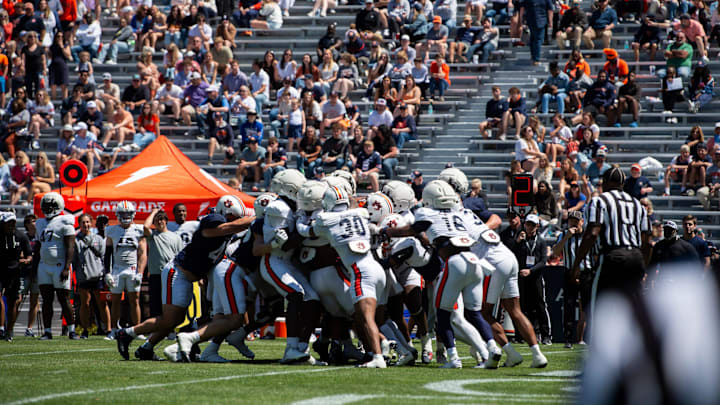 Jo Simmons didn't sound overly confident about the Auburn Tigers' offensive line just yet