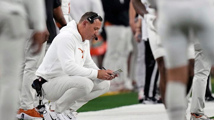 Texas Longhorns head coach Steve Sarkisian looks at his play sheet against Ohio State Buckeyes in the second quarter of the Cotton Bowl Classic during the College Football Playoff semifinal game at AT&T Stadium in Arlington, Texas on January, 10, 2025. Texas Longhorns head coach Steve Sarkisian looks at his play sheet against Ohio State Buckeyes in the second quarter of the Cotton Bowl Classic during the College Football Playoff semifinal game at AT&T Stadium in Arlington, Texas on January, 10, 2025.