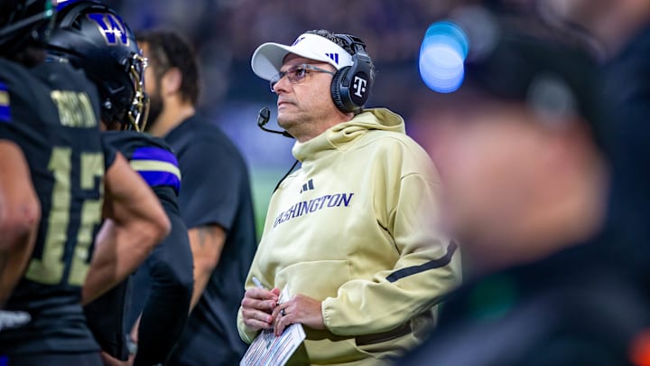 Jedd Fisch looks on as the Huskies played Rutgers. 