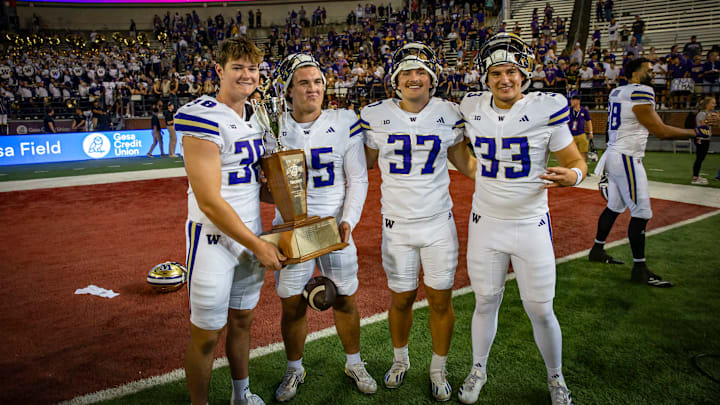 Next kickerEthan Moczulski (37) is shown with punter Trevor Allen (38), kicker Grady Gross and snapper Ryan Kean (33).
