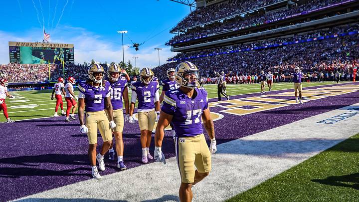 Jayden Limar celebrates his touchdown run late in the Apple Cup. Jayden Limar celebrates his touchdown run late in the Apple Cup.