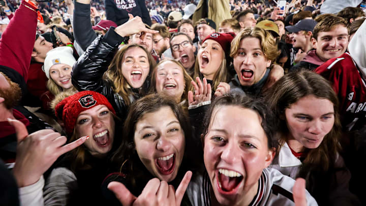 South Carolina football fans celebrating inside Williams-Brice Stadium after a big win over the Tennessee Volunteers in 2022