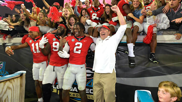 Georgia Bulldogs head coach Kirby Smart celebrates with his players and fans after their victory over Florida. The annual Georgia vs Florida football rivalry was held at TIAA Bank Field in Jacksonville, FL Saturday, October 29, 2022. The Bulldogs went in at halftime with a 28 to 3 lead over the Gators and won with a final score of 42 to 20. [Bob Self/Florida Times-Union]

Jki 102822 Bs Georgia Vs Florida Football Game 2nd Half 06