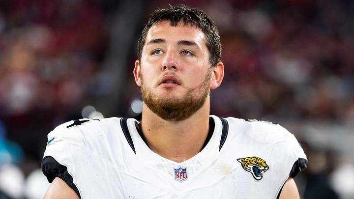 Nov 23, 2025; Glendale, Arizona, USA; Jacksonville Jaguars offensive lineman Wyatt Milum (64) against the Arizona Cardinals at State Farm Stadium. 