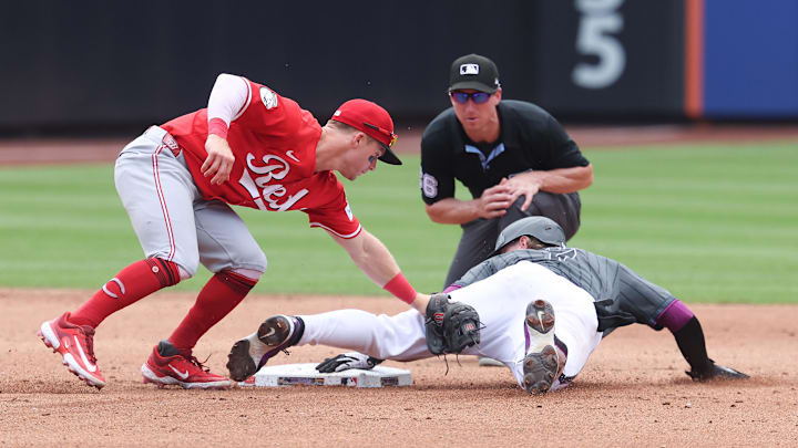 Jul 20, 2025; New York City, New York, USA; New York Mets third baseman Brett Baty (7) steals second base before being tagged by Cincinnati Reds second baseman Matt McLain (9) during the fifth inning at Citi Field. Mandatory Credit: Vincent Carchietta-Imagn Images