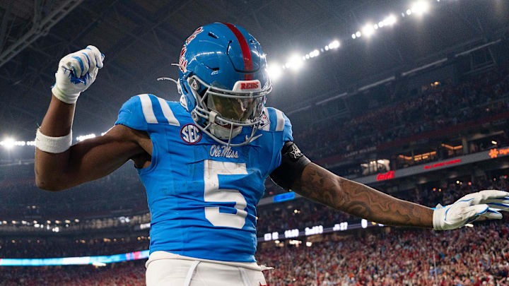 Ole Miss running back Kewan Lacy (5) celebrates after scoreing a touchdown during the CFP Fiesta Bowl against Miami at the State Farm Stadium, in Glendale, Ariz., on Thursday, Jan. 8, 2026.