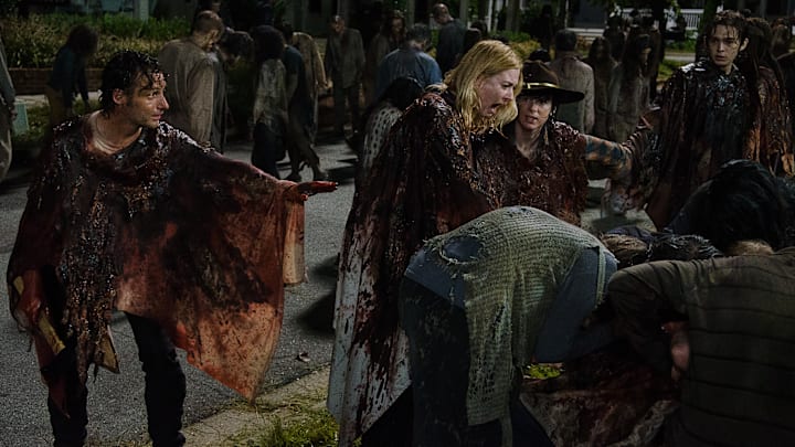 Andrew Lincoln as Rick Grimes, Chandler Riggs as Carl Grimes, Alexandra Breckenridge as Jessie Anderson, and Austin Abrams as Ron in The Walking Dead season 6