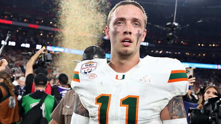 Jan 8, 2026; Glendale, AZ, USA; Miami Hurricanes quarterback Carson Beck (11) reacts after winning the 2026 Fiesta Bowl and semifinal game of the College Football Playoff at State Farm Stadium.