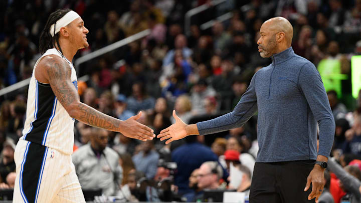 Mar 21, 2025; Washington, District of Columbia, USA; Orlando Magic forward Paolo Banchero (5) and head coach Jamahl Mosley react during the second quarter against the Washington Wizards at Capital One Arena. Mandatory Credit: Reggie Hildred-Imagn Images Mar 21, 2025; Washington, District of Columbia, USA; Orlando Magic forward Paolo Banchero (5) and head coach Jamahl Mosley react during the second quarter against the Washington Wizards at Capital One Arena. Mandatory Credit: Reggie Hildred-Imagn Images
