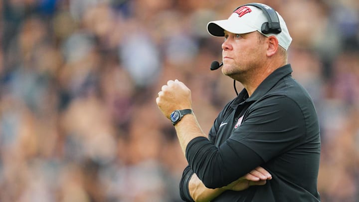 UNLV Rebels head coach Barry Odom looks on during the first half against the Kansas Jayhawks at Children's Mercy Park. 