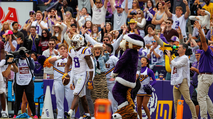 Nov 25, 2023; Baton Rouge, Louisiana, USA;  LSU Tigers fans react to a touchdown by wide receiver