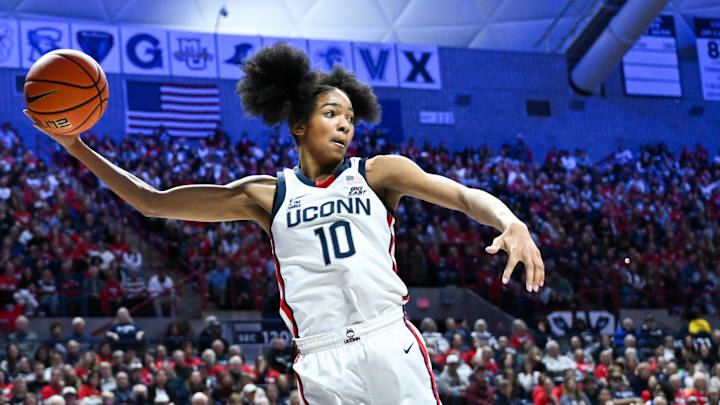 Nov 20, 2024; Storrs, Connecticut, USA; Connecticut Huskies guard Qadence Samuels (10) leaps to keep the ball inbounds during the second half against the Fairleigh Dickinson Knights at Harry A. Gampel Pavilion. Mandatory Credit: Mark Smith-Imagn Images Nov 20, 2024; Storrs, Connecticut, USA; Connecticut Huskies guard Qadence Samuels (10) leaps to keep the ball inbounds during the second half against the Fairleigh Dickinson Knights at Harry A. Gampel Pavilion. Mandatory Credit: Mark Smith-Imagn Images