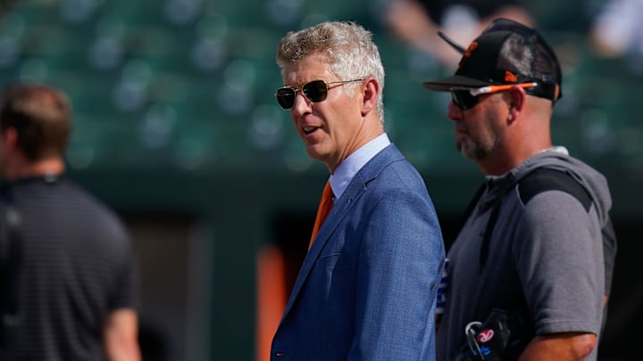Jul 27, 2022; Baltimore, Maryland, USA; Baltimore Orioles general manager Mike Elias reacts on the field before the game between the Baltimore Orioles and the Tampa Bay Rays at Oriole Park at Camden Yards.