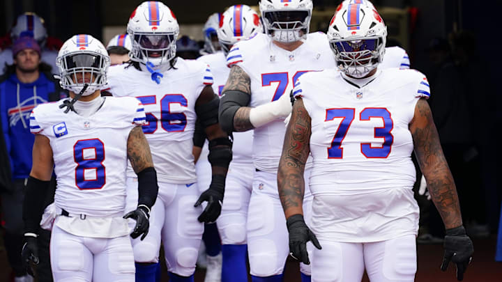 Buffalo Bills LT Dion Dawkins and LB Terrel Bernard warm up prior to the game against the Tampa Bay Buccaneers.
