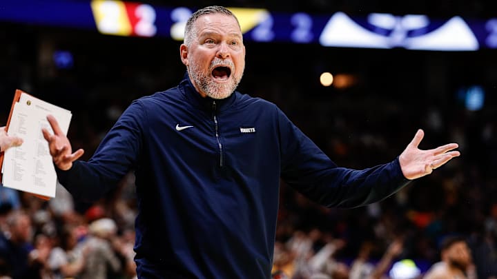 Nov 22, 2024; Denver, Colorado, USA; Denver Nuggets head coach Michael Malone reacts in the third quarter against the Dallas Mavericks at Ball Arena. Mandatory Credit: Isaiah J. Downing-Imagn Images