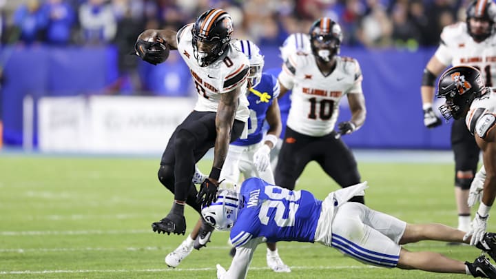 Oklahoma State Cowboys running back Ollie Gordon II (0) scored three touchdowns in the first half against BYU.