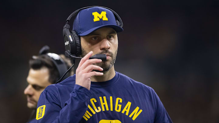 Feds indict ex-Michigan football staffer Matt Weiss